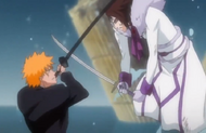 Ichigo blocks Muramasa's attack.