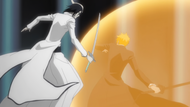 Ichigo being protected by Orihime while Ulquiorra attacks.