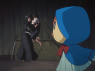 Rukia instructs Ririn to run away with the children.