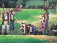 Orihime watches as Daiji's subordinates bow before him.