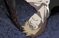 Kokutō stabs his blade into the ground next to Ichigo's head.