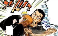 Aramaki chops Orihime's neck, knocking her out.