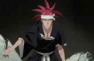 Renji leans on his sword for support.