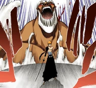 Yammy reappears behind Ichigo after recovering from his attack.