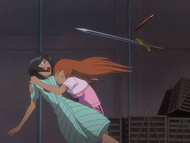 Yoshi's Doll, Nieder, bounces harmlessly off of Orihime.