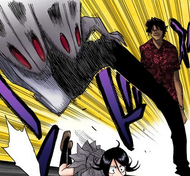 Sado kicks the leeches off Rukia.