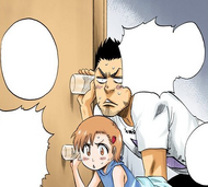 Yuzu and Isshin listen to Ichigo talk to Rukia in his room.