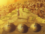 Renji and Rukia stand in front of the graves of their friends.