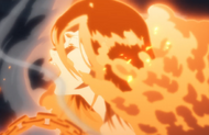 Rukia bursts out of the lava after being revived.