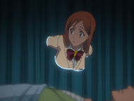 Orihime slips into Ichigo's room.