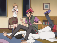 Renji Abarai subdues Isshin after breaking into the Kurosaki Clinic while Yuzu watches in shock.