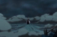 Kenpachi stands in the middle of a crater.