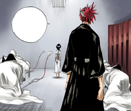 Renji and Rukia stand inside the latter's new cell.