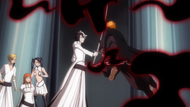 Ulquiorra prevents Ichigo from helping Orihime.