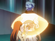 Orihime heals the scar over Grimmjow's tattoo.