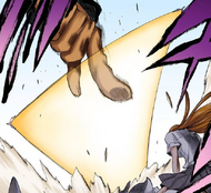 Yammy's finger is blocked by Orihime's Santen Kesshun.