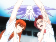 Numb Chandelier watches as Orihime struggles with a possessed Chizuru Honshō.