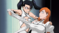 Loly maniacally attacks Orihime.