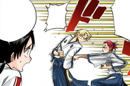 Hinamori admonishes Renji for punching Izuru in the arm.