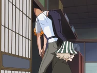 Urahara has Tessai carry Ichigo's body to another room for safekeeping.