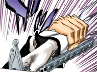 Ichigo grabs Ulquiorra's sword hand by the wrist mid-attack.