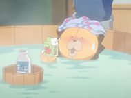 Kon relaxes in the hot water.