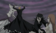 Muramasa in Hollow form fights Ichigo as Rukia and Orihime look on.
