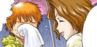 Masaki cleans Ichigo Kurosaki's face.