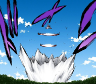 Yammy fires a Bala into the ground below.