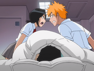 Uryū pulls himself under the covers while Ichigo and Rukia argue.