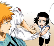 Karin grabs Ichigo's shirt as he attempts to leave.