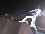 Uryū attempts to pull Ichigo out of the house.
