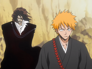 Zangetsu appears behind Ichigo after the latter activates the Tenshintai.