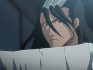 Byakuya reads the letter from Yamamoto.