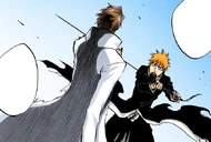 Aizen stops Ichigo's blade with his bare hand.