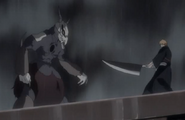 Ichigo faces off against the Hollow Tōjū.