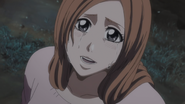 Orihime is relieved to see Ichigo is well.