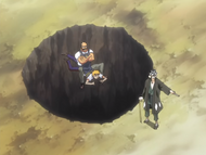 A hole opens up underneath Tessai and Ichigo.