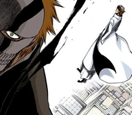 Aizen effortlessly evades the Getsuga Tenshō.