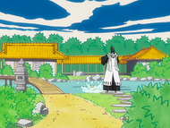 Byakuya feeds the carp at the Kuchiki Manor.