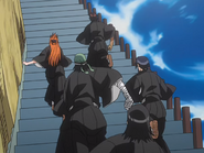 Orihime and friends run up the Sōkyoku Hill to get to Ichigo.