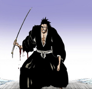 Kenpachi's arm is mangled by The Compulsory.