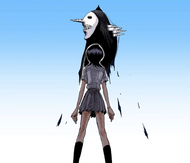 Rukia stares in fright at the emerging Menos Grande.