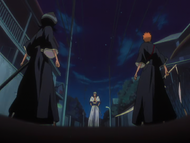 Grimmjow approaches Ichigo and Rukia.