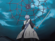 Dalk forms a metal web in the air above Hitsugaya.