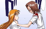 Chizuru grabs Orihime while being controlled with Bulb Scatter.