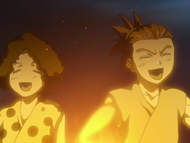 Renji and his friends laugh around the fire.