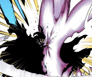 Yhwach pushes back Ichigo's attack.