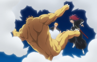 Kon suddenly bulks up into a muscular form, creating a cushion for Renji and Ichigo.