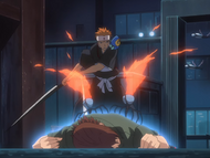 Ichigo slashes through the Bitto on Keigo's back.